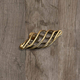 Bouton Valentia, L 79 mm, H 41 mm, aspect laiton antique